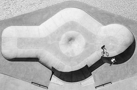 Baptiste Fauchille, France, with a shot from a buddies trip with a business goal showing Alex Bibollet’s shadow in the bowl of Fillinges, France.