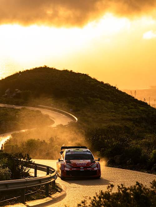 Elfyn Evans and Scott Martin in their Toyota Gazoo Racing WRT car race through dramatic mountain roads at sunset during Red Bull World Rally Championship Spain 2026 in Las Palmas