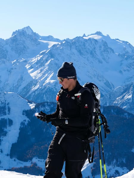 Xavier De Le Rue on a mountain top.