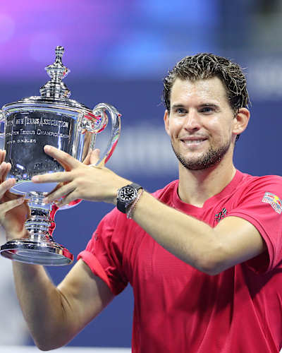 Dominic Thiem holds up the trophy at the US Open.