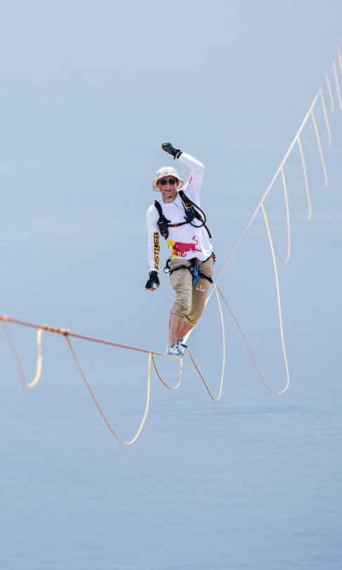 Jaan Roose balances on a 1.9cm slackline in Italy as he attempts to cross the Messina Strait 