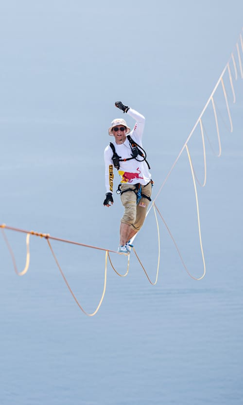 Jaan Roose balances on a 1.9cm slackline in Italy as he attempts to cross the Messina Strait 