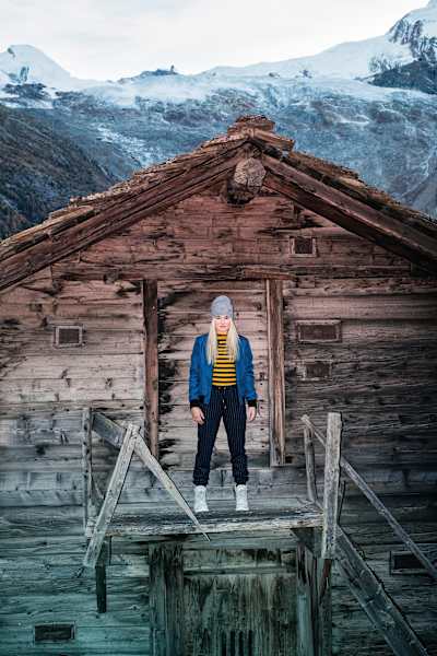 Snowboarder Katie Ormerod at a mountain hut.