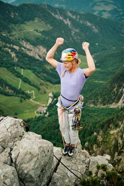 German climber Lara Neumeier celebrates the completion of the Alpine Trilogy after conquering The Emperor's New Clothes in Austria. 