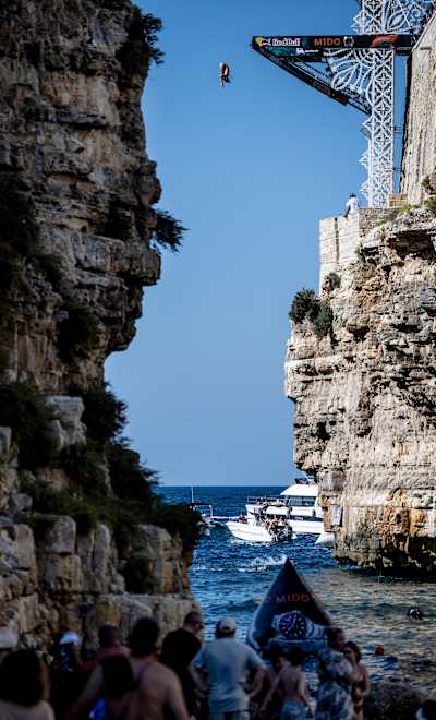 In 2024, Kaylea Arnett plunges from Polignano a Mare cliffs and the 21m platform above the Adriatic