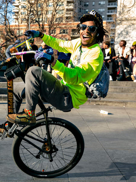 Bike Life rider Jae Milez pops a wheelie.