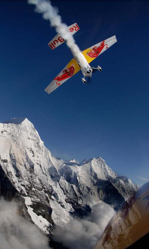 Kirby Chambliss of the USA flies in front of the Eiger North Face during the Red Bull Air Race in Interlaken, Switherland on July 12, 2007.