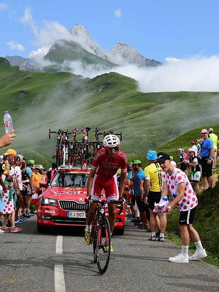 Passionate crowds cheer on riders at the Tour de France. 