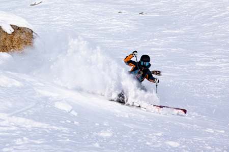 Max Palm doing a backflip over Manon Loschi in Les Arcs, France on March 3, 2023.
