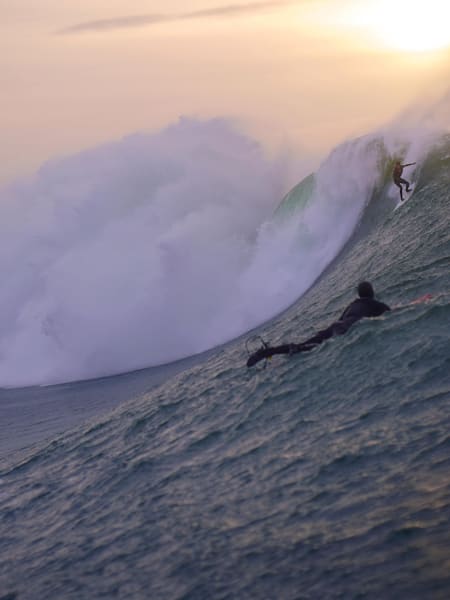 Irish professional big wave surfer Conor Maguire prepares to drop into a huge left at Mullaghmore.