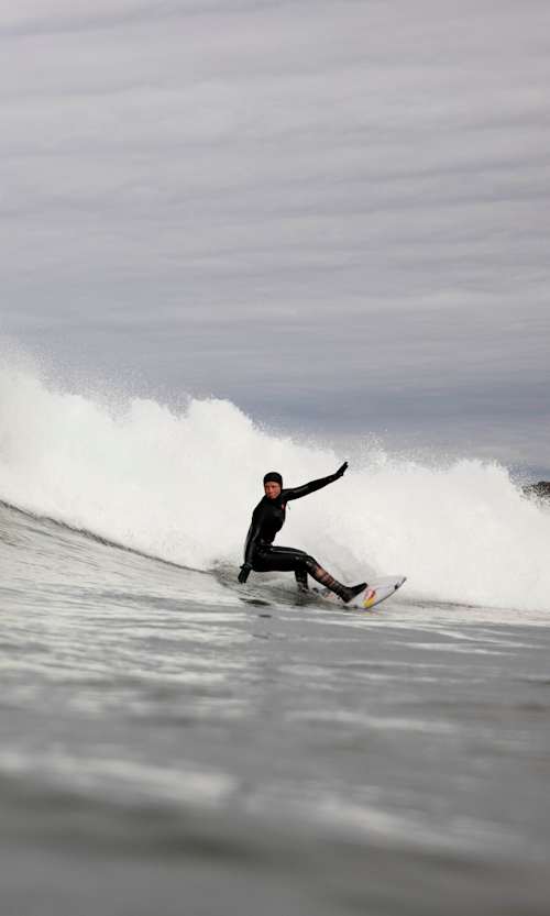 Sanoa Olin on a perfect right in Cox Bay, Tofino.