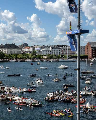 Ukrainian diver Antonina Vyshyvanova performs an armstand dive from 21.5 metres at the Copenhagen Opera House during the thrilling 2022 Red Bull Cliff Diving World Series event