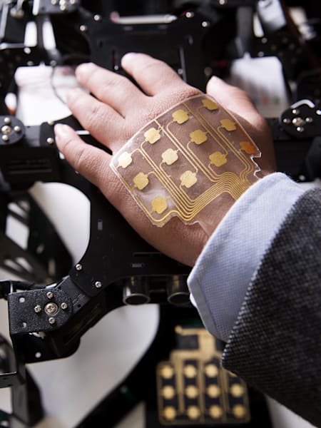 Wootzkin’s robotic skin on a human hand.
