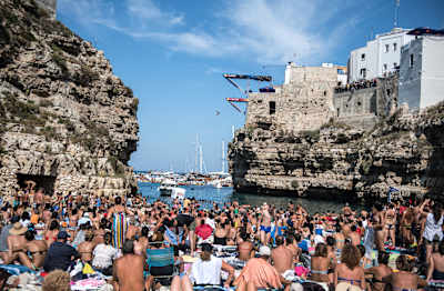 Xantheia Pennisi of Australia dives from the 21 metre platform during the final stop of the Red Bull Cliff Diving World Series in Polignano a Mare, Italy on September 23, 2018.