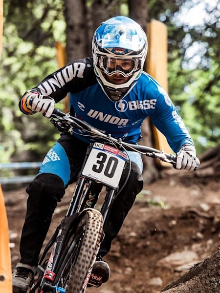 Ruaridh Cunningham racing during finals at Lenzerheide DH World Cup on July 9, 2016