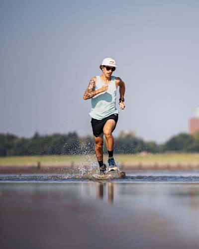 Florian Neuschwander sprints across the water at Red Bull Wattlauf in Cuxhaven, Germany, on 5 September 2024. 