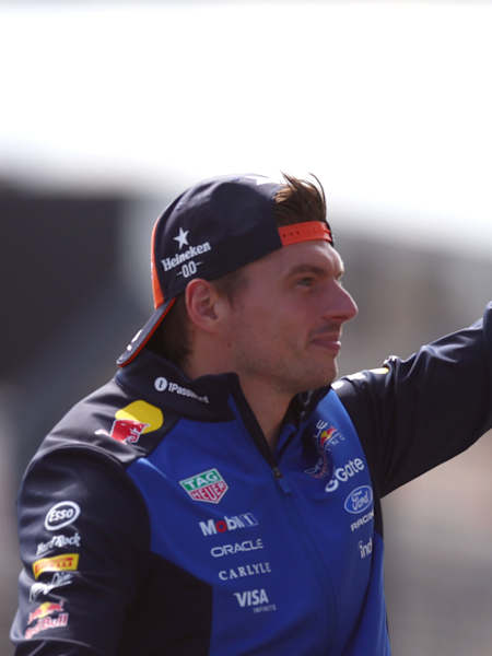 Max Verstappen waves on the drivers parade prior to the F1 Grand Prix of Netherlands at Circuit Zandvoort on August 23, 2026 in Zandvoort, Netherlands.