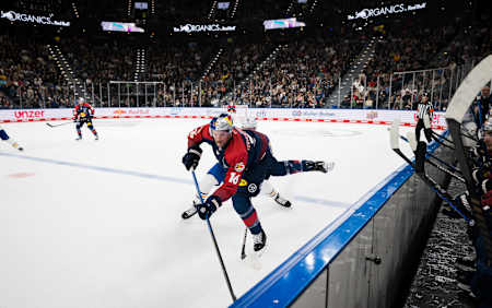 Ice hockey players compete during the grand opening of the SAP Garden, the new home of the EHC Red Bull München in Munich, Germany on September 27, 2024.