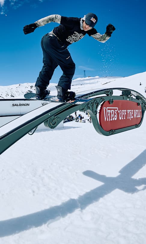 Gian Sutter launches off a rail during the 2026 Escape Cup in Laax, Switzerland, with the Red Bull athlete soaring above the snow-covered mountain park