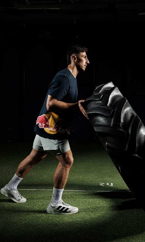 Niko Maisuradze, a functional fitness athlete from Georgia, does strength training with a truck tyre
