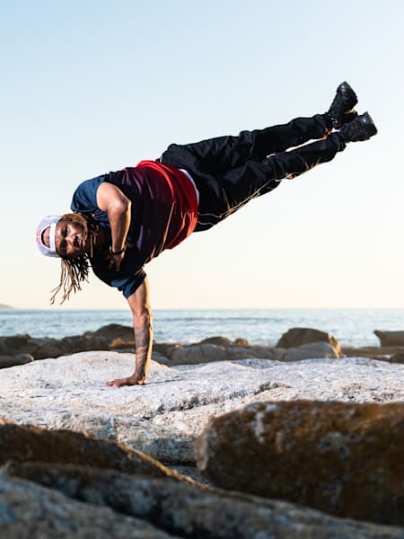 Vouks does a freeze at the beach during Red Bull BC One in Cape Town, South Africa on March 5, 2022. 