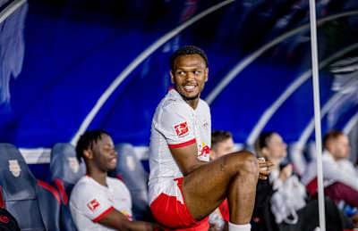 Loïs Openda of RB Leipzig relaxes on the bench during a training match.