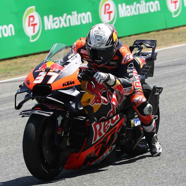 Pedro Acosta powers his Red Bull KTM race bike around Changwat Buriram circuit during Thailand MotoGP 2025, showcasing speed and skill in bold Red Bull livery
