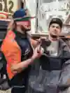 Toby Price gives Cyril Despres a fresh beard trim Art