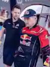 Carlos Sainz inspects his Red Bull Ford rally car at Rallye du Maroc event in Morocco in 2024