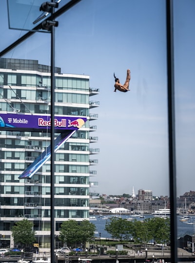 Catalin Preda of Romania dives from the 27.5 metre platform during the first competition day of the first stop of the Red Bull Cliff Diving World Series in Boston, USA on June 2, 2023.