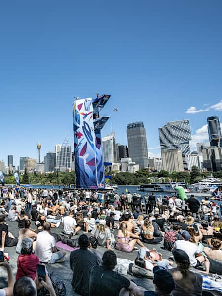 Aidan Heslop of the UK dives from the 27.5-metre platform during the final competition day of the Red Bull Cliff Diving World Series in Sydney, Australia on October 15, 2022.