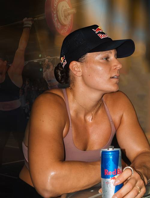Laura Horváth, a fitness athlete, for her film Together We Rise, drinking a Red Bull