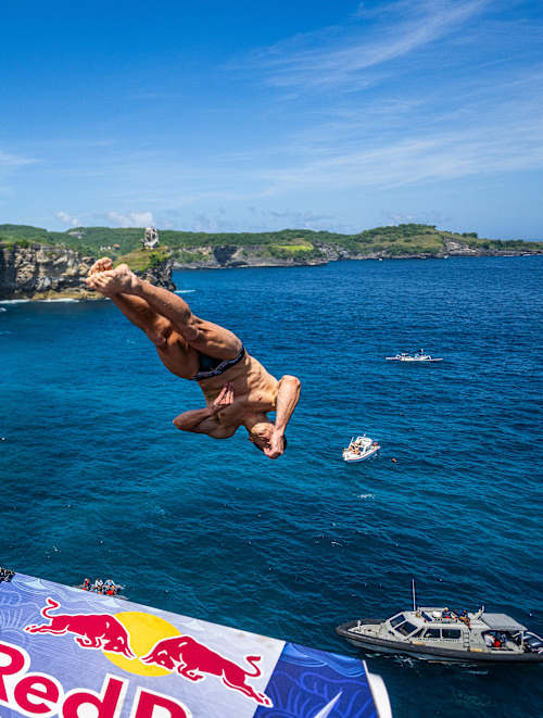 Aidan Heslop of the UK performs a breathtaking dive from the 27 metre platform at Broken Beach in Bali, Indonesia for the first stop of the Red Bull Cliff Diving World Series in 2026