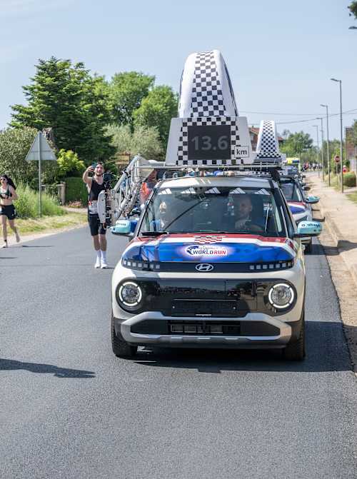 Runners and wheelchair athletes push their limits at the Wings for Life World Run Flagship Run in Zadar, Croatia in May 2025, with the Catcher Car close behind.