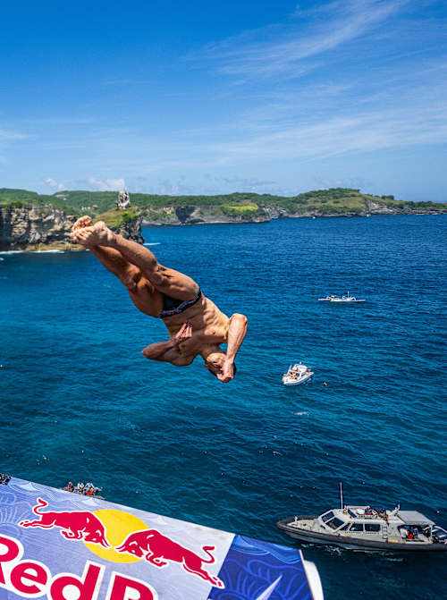Aidan Heslop of the UK performs a breathtaking dive from the 27 metre platform at Broken Beach in Bali, Indonesia for the first stop of the Red Bull Cliff Diving World Series in 2026
