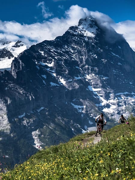 Markus Gerber and Francois Bucher mountain bike before the Eiger in Grindelwald, Switzerland on July 4, 2018.
