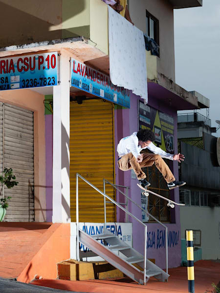 Korahn Gayle kickflips over the bar from the driveway in Brazil