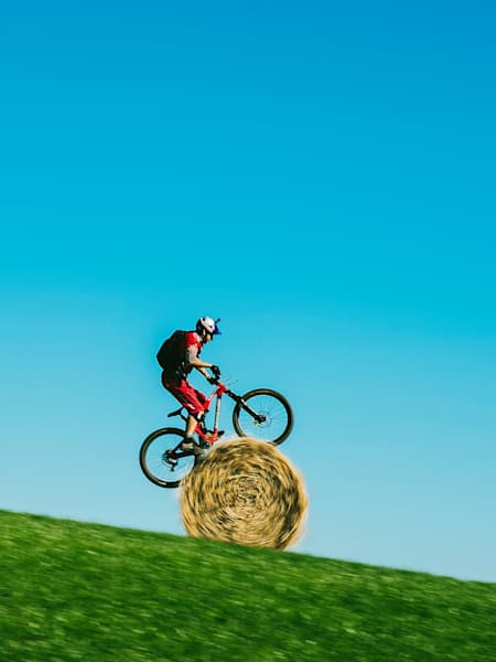 Danny Macaskill performing on his bike during the shoot of "A Wee Day Out"