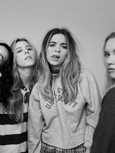 The Aces pose for a black-and-white group portrait.
