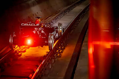 Patrick Friesacher drives a Red Bull Racing Formula One car out of a tunnel during the On Rails project in Madrid, Spain, on 8 April 2026
