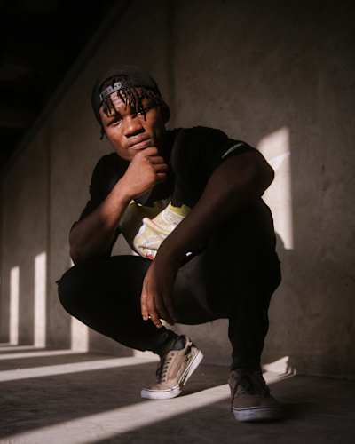 A portrait of Nigerian dancer BJMIAH. 