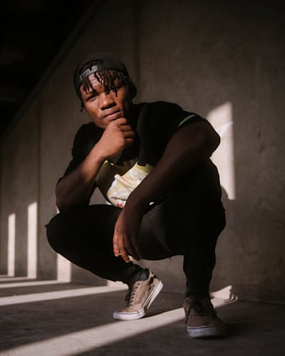 A portrait of Nigerian dancer BJMIAH. 