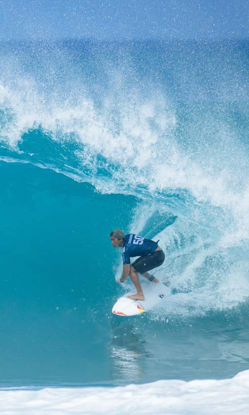 Kanoa Igarashi of Japan rides a massive barrel at the Lexus Pipe Pro, World Surf League's 2025 opener in Oʻahu, Hawaii.