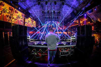 A photo of looking out from behind the decks of legendary Ibiza club, Amnesia.