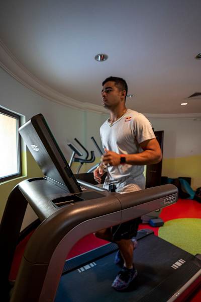 Indian cricket allrounder Riyan Parag runs on a treadmill during a gym training session.