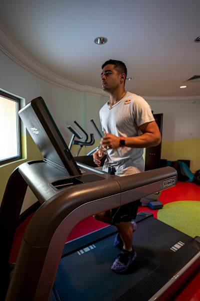 Indian cricket allrounder Riyan Parag runs on a treadmill during a gym training session.
