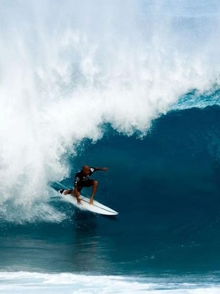 Surfer Kelly Slater in action at the Volcom Pipe Pro 2016 in Oahu, Hawaii