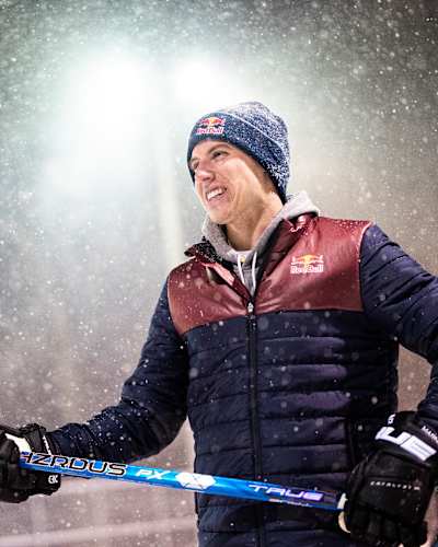 Mitch Marner on an outdoor rink at night during a snowstorm 