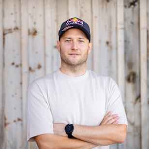 Dennis Zenz posing in Fuschl am See, Austria, in 2024.