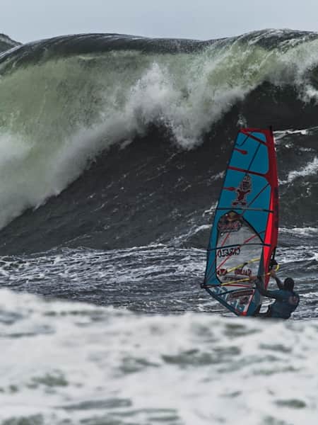A windsurfer takes on giant waves at Red Bull Storm Chase